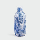 Elegant indigo ceramic vase featuring traditional patterns

