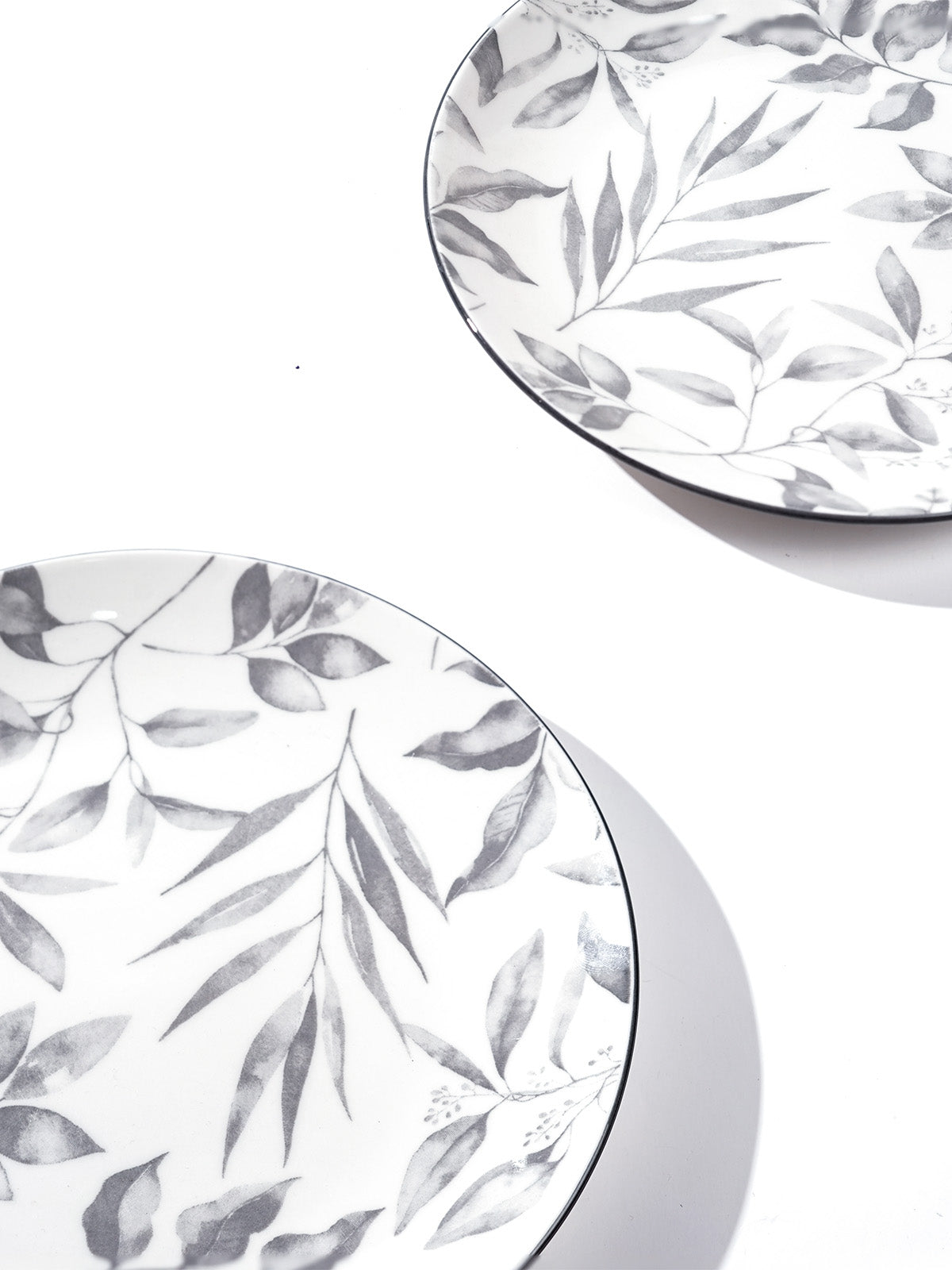 Ivory quarter plates arranged for a stylish dining table setting

