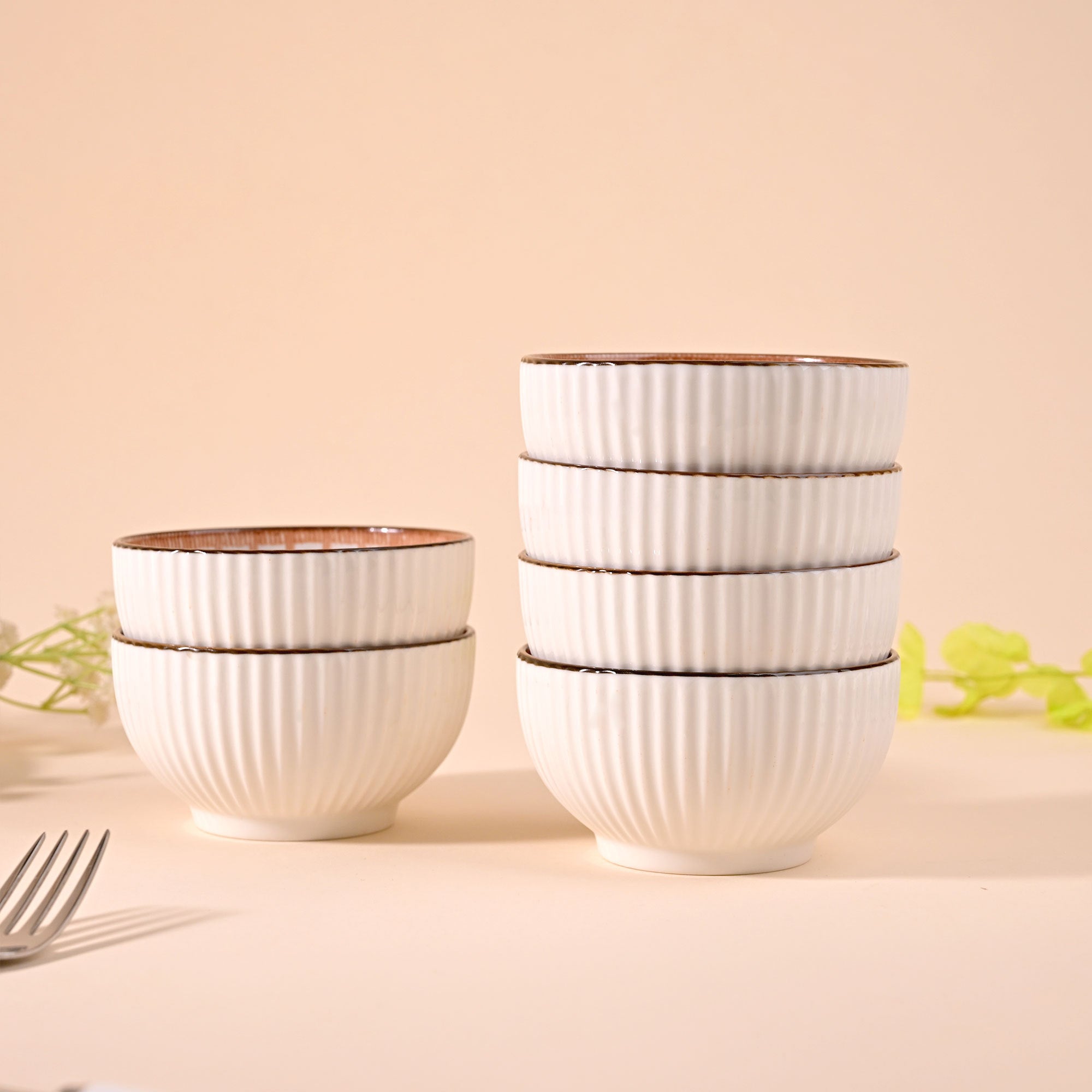 Decorative porcelain bowls with jasmine-inspired design

