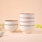 Decorative porcelain bowls with jasmine-inspired design

