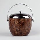 Luxe Stainless Steel Ice Bucket Displayed on a Modern Dining Table