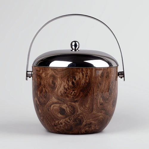 Luxe Stainless Steel Ice Bucket Displayed on a Modern Dining Table