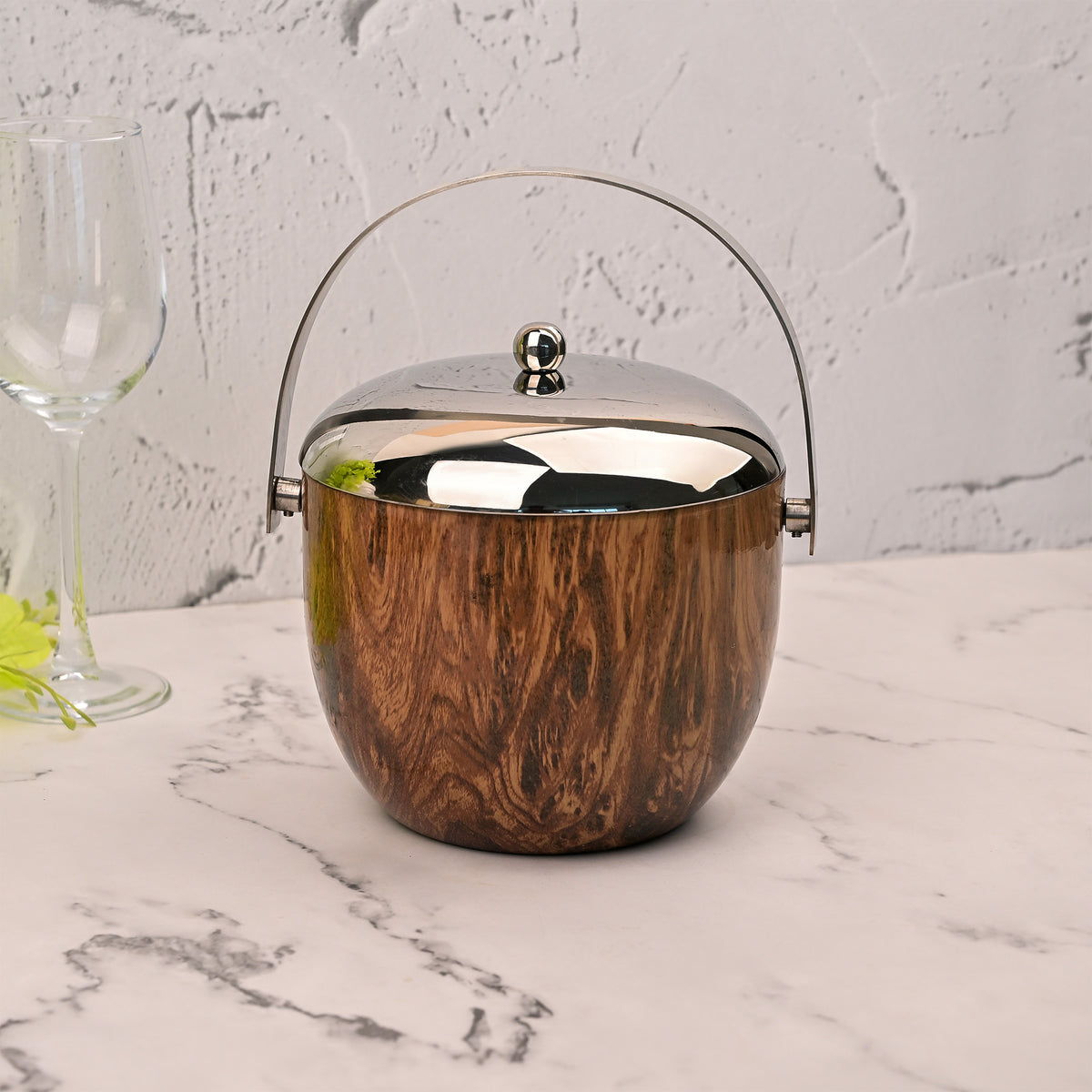 Stainless Steel Ice Bucket Displayed on a Sophisticated Serving Counter
