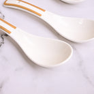 Stylish porcelain soup bowls with gold edge detailing

