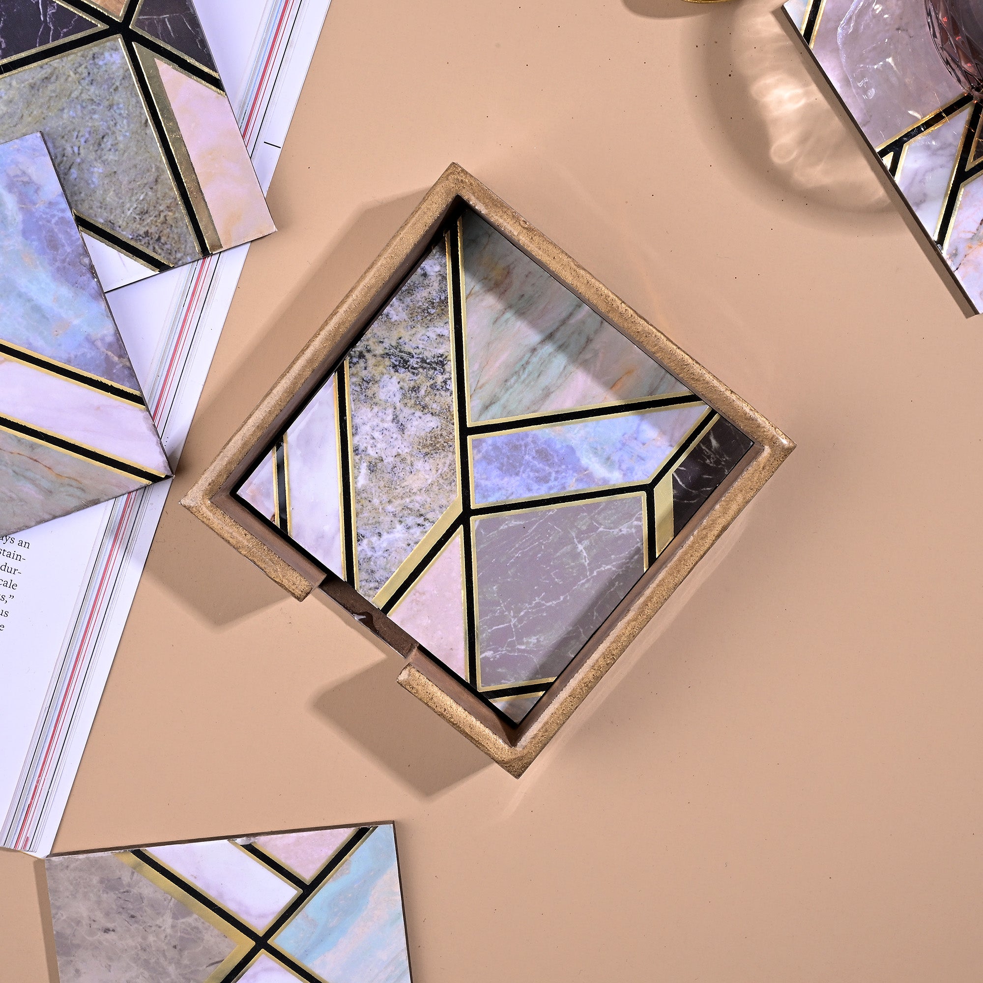 Shades of Green square coasters arranged together

