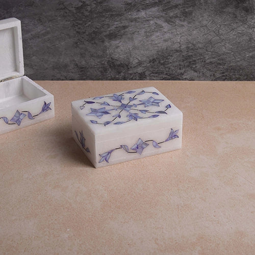 Handcrafted blue marble jewelry box with intricate design

