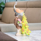 Majestic sunrise peacock statue with vibrant feather details

