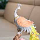 Elegant peacock statue inspired by a beautiful sunrise

