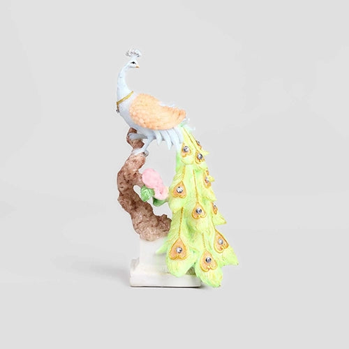 Beautiful peacock sculpture with intricate feather detailing

