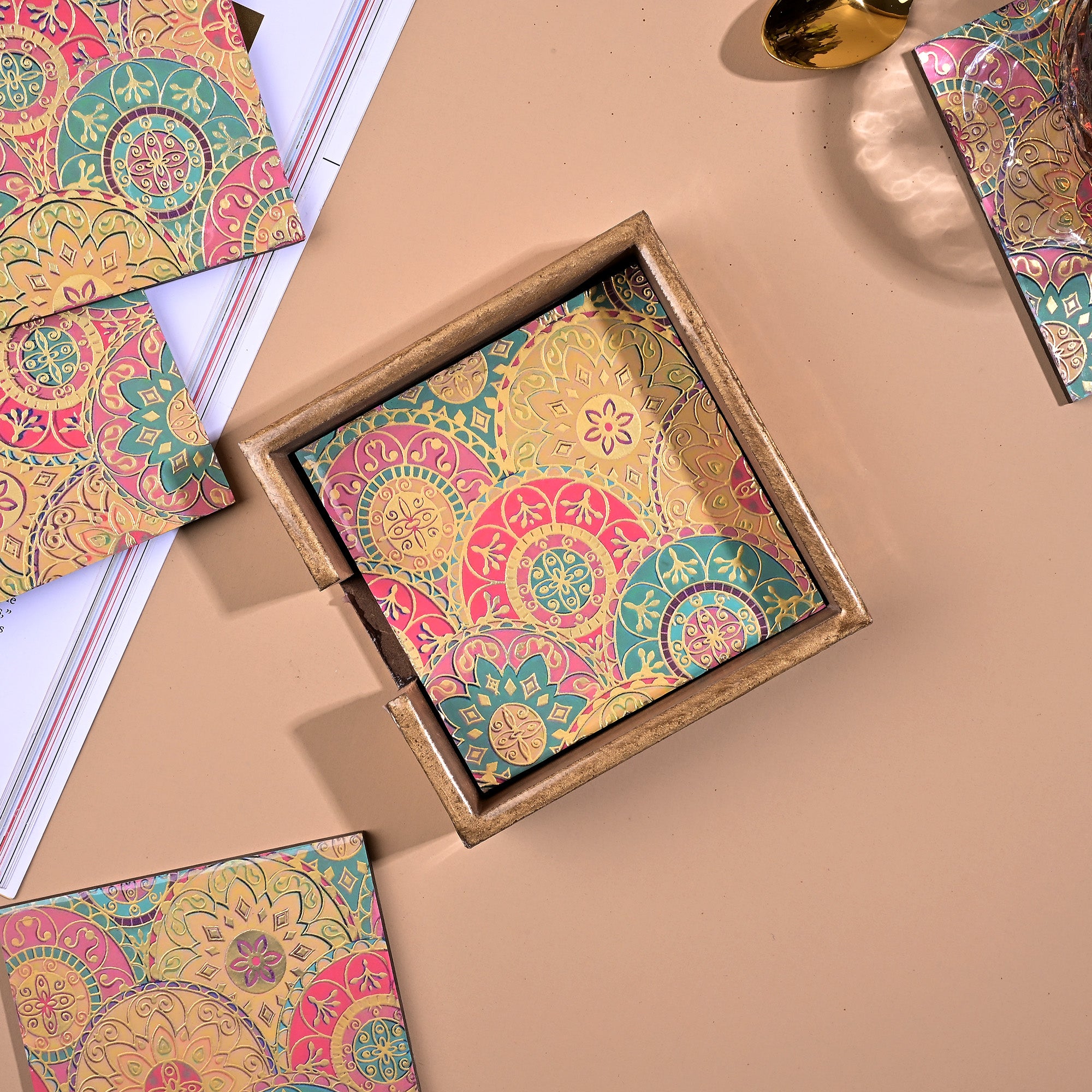 Colorful Mandala printed coasters arranged together

