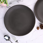 Set of 2 matte black ceramic dinner plates

