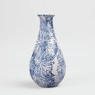 Decorative midnight blue bottle vase with textured surface

