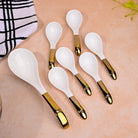 Elegant dark and gold bowls for modern table settings


