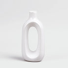 Elegant white hollow vase for contemporary home decor


