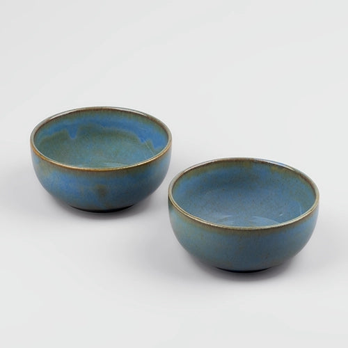 Set of two mint green porcelain bowls

