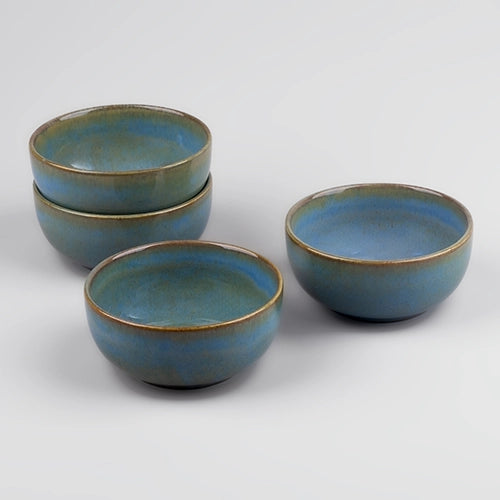 Set of four mint green porcelain bowls

