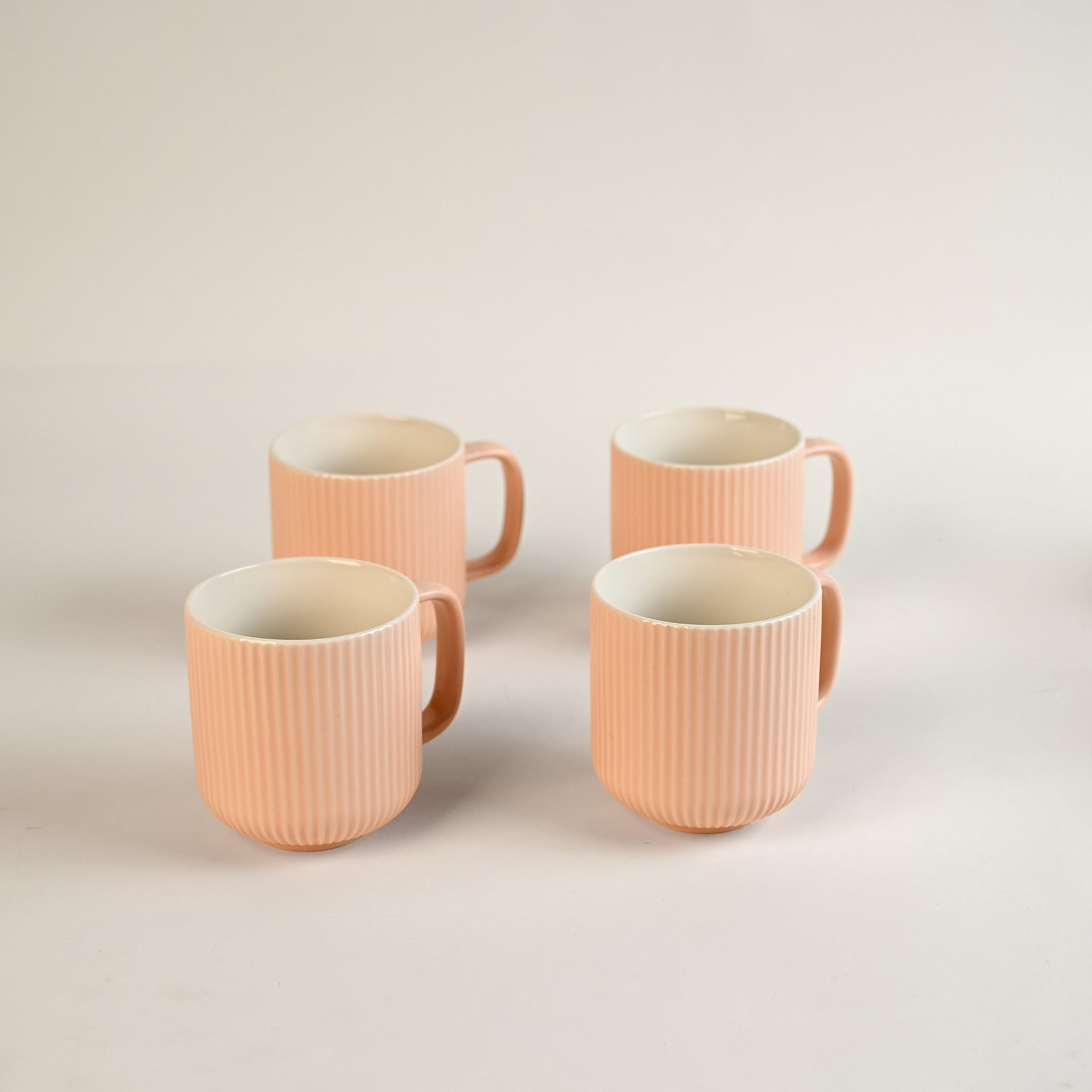 Misty rose ribbed bone china coffee mugs

