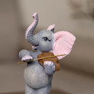 Elephant musician statues for living room shelf and tabletop styling

