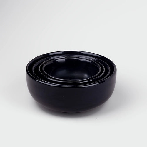 Set of four black serving bowls

