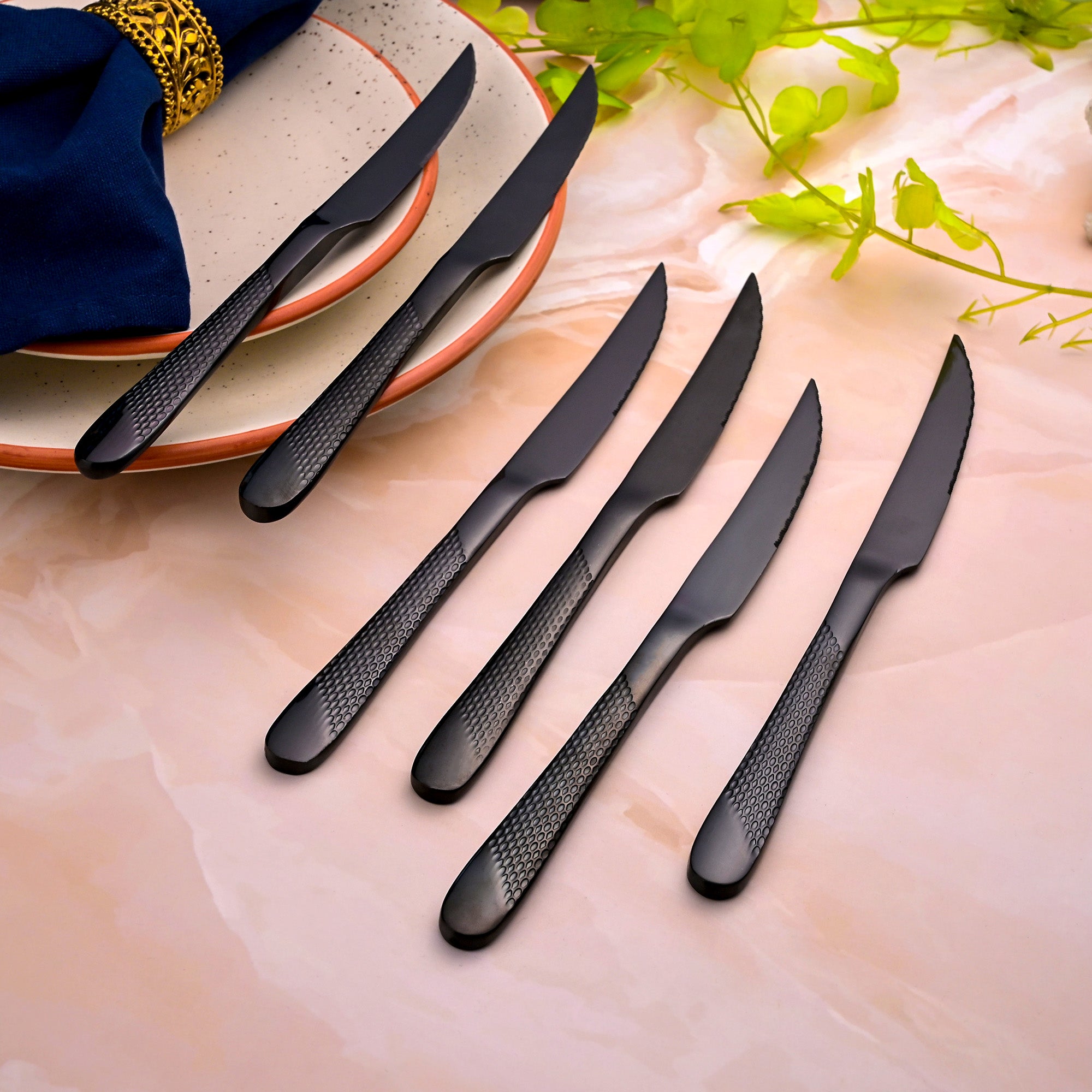 Close-Up View of Nightfall Stainless Steel Black Knives with a Refined Finish

