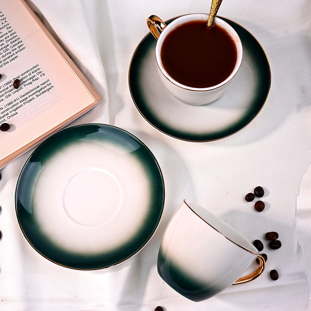 Opulent Gold Trim Cups Showing Elegant Rim and Handle Details