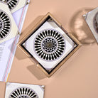 Opulent Mandala coasters arranged together

