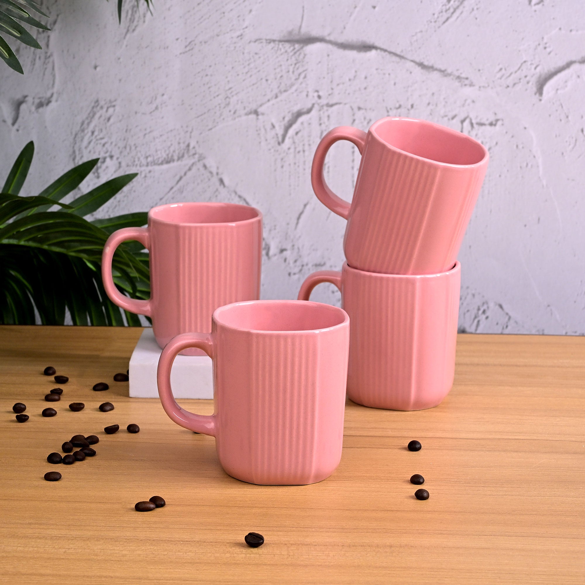 Set of 4 pastel pink ceramic coffee mugs

