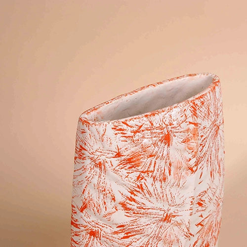 Leaf imprint flower vase in a soft peach finish

