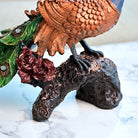 Handcrafted peacock and tree trunk decorative statue

