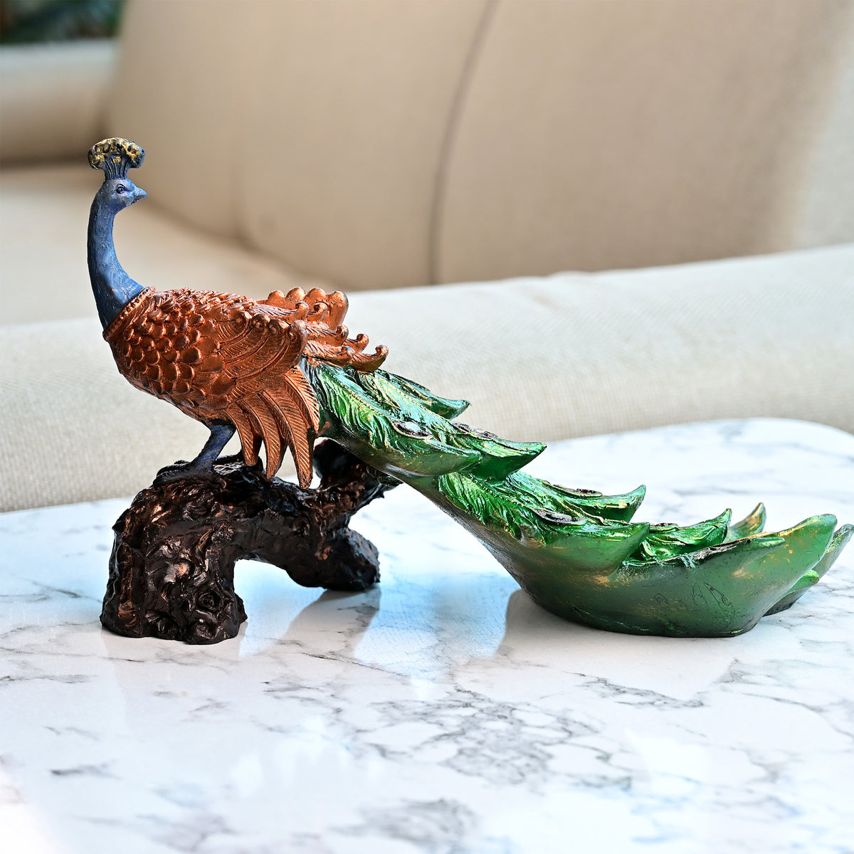 Wooden tree trunk statue featuring a colorful peacock

