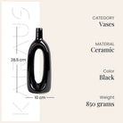 Decorative pitch black vase featuring a unique hollow shape

