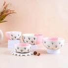 Four-piece blush pink bowl set

