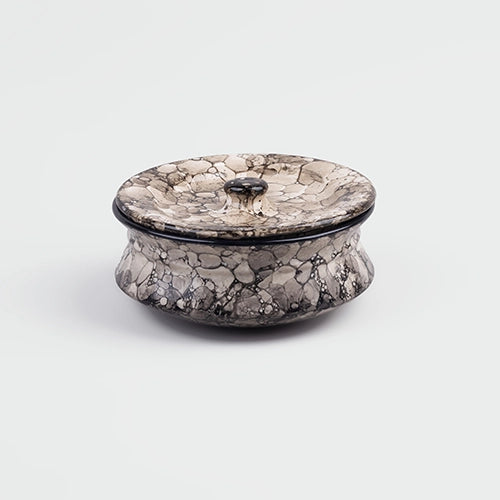 Elegant ceramic casserole dish with matching lid

