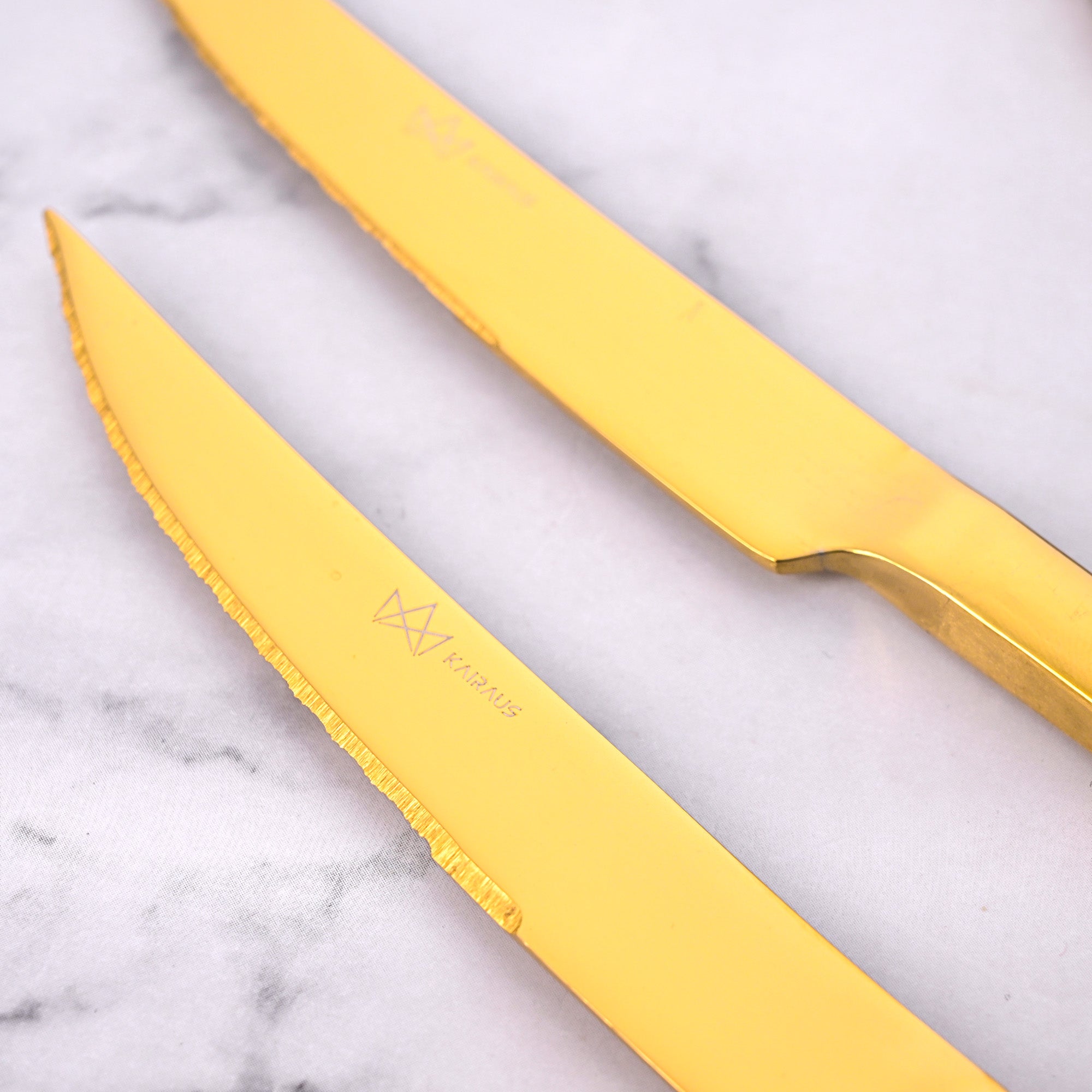 Elegant Gold Stainless Steel Knives with a Sleek and Polished Design

