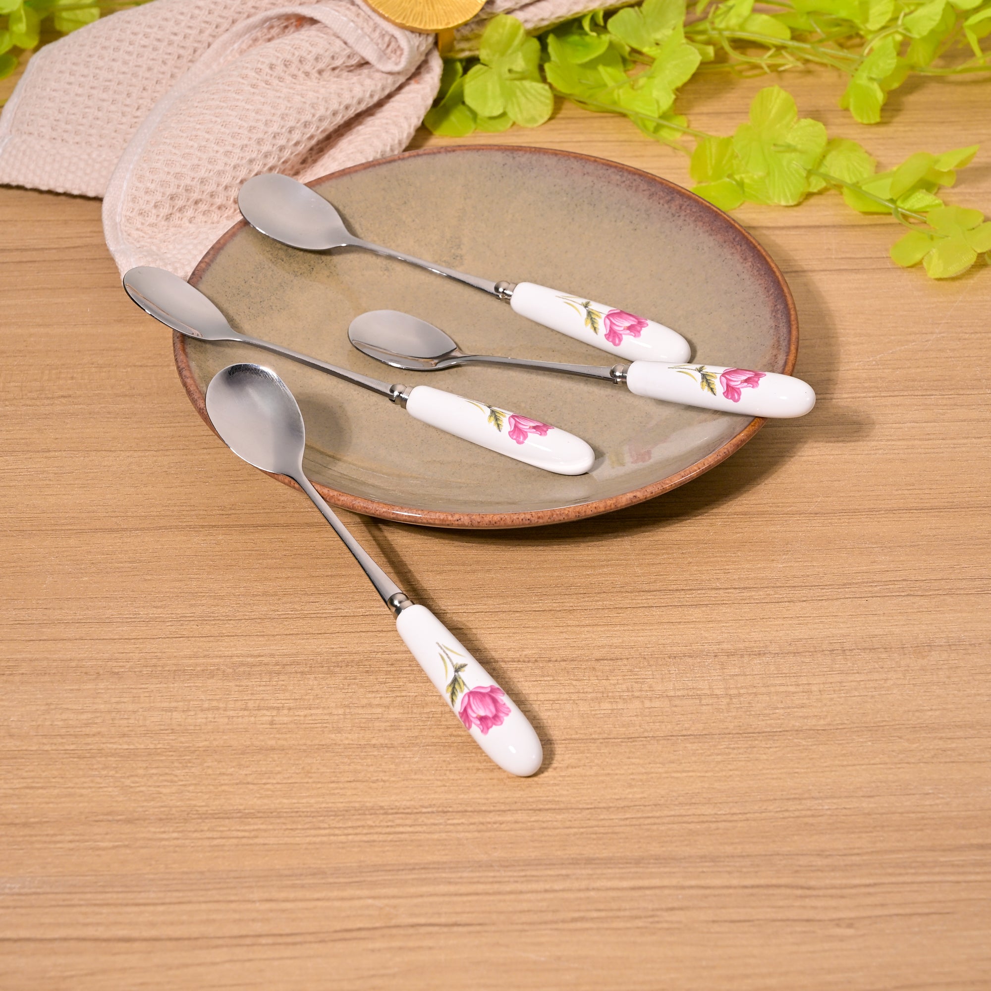 Radiant Rose Dessert Spoons Set of 4 with Elegant Design

