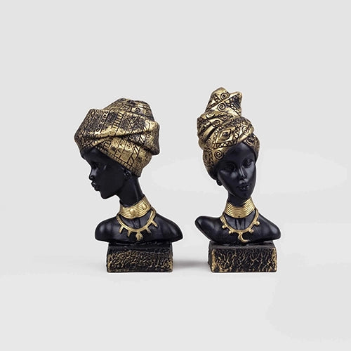 African queen figurines with detailed dresses and accessories

