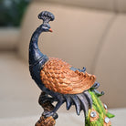 Elegant peacock statue with detailed feathers for home decoration

