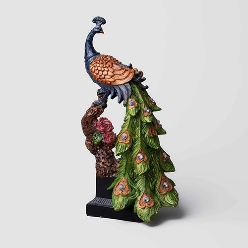 Detailed peacock statue with vibrant decorative feather patterns

