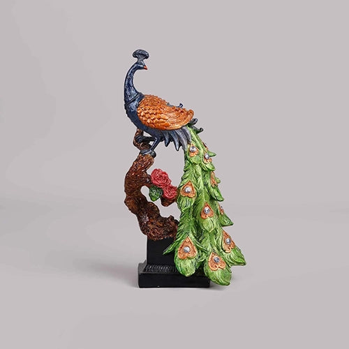 Artistic peacock figurine displayed as a home decor centerpiece

