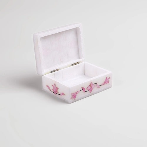 Decorative royal pink marble jewelry vault with intricate details

