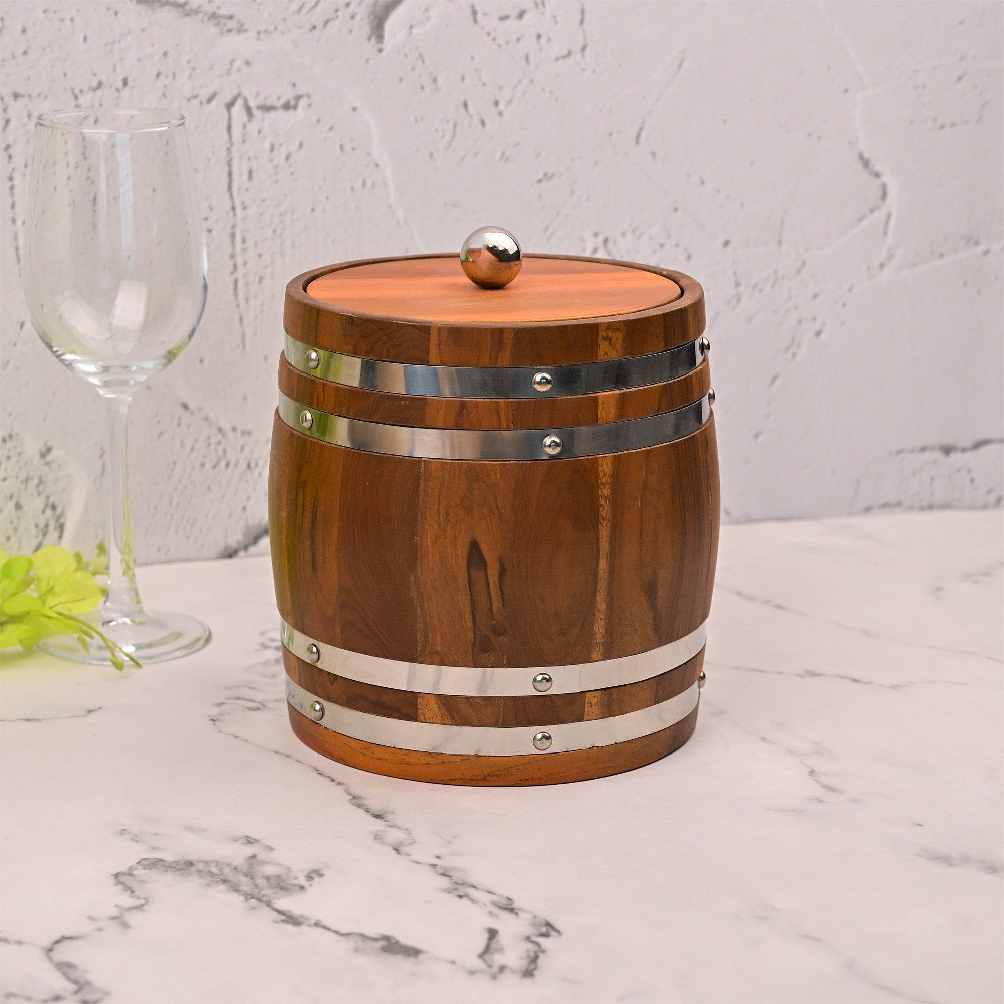 Rustic Wooden Ice Bucket Displayed on a Contemporary Serving Counter