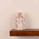 Elegant white rustic vase for shelf and table decor

