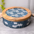 Handcrafted wooden casserole with sea-inspired floral artwork

