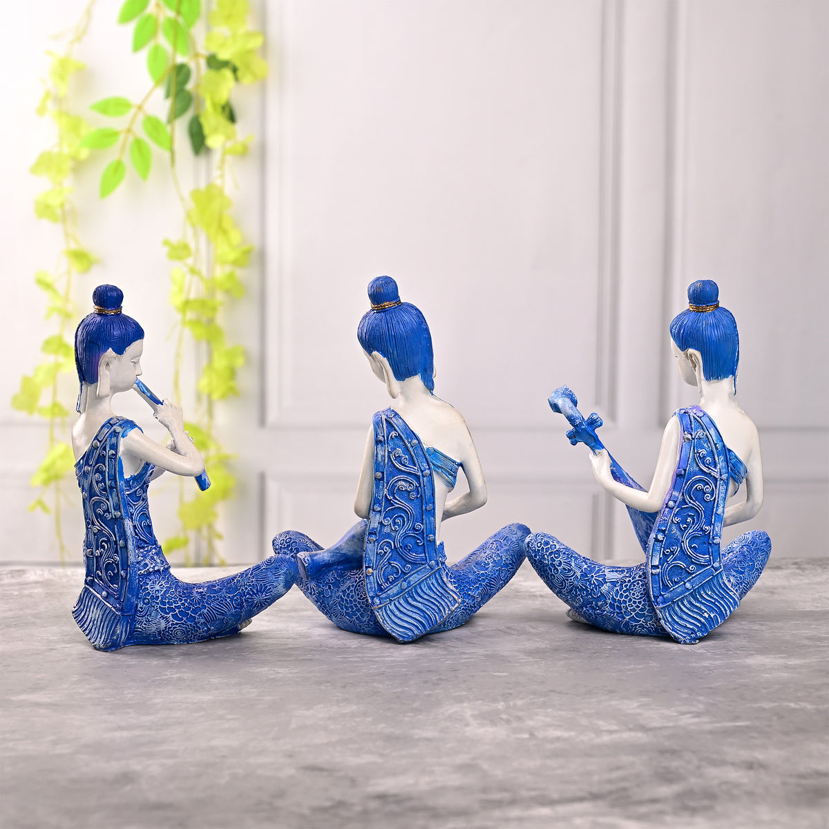 Elegant trio figurine set with a calm and peaceful aesthetic

