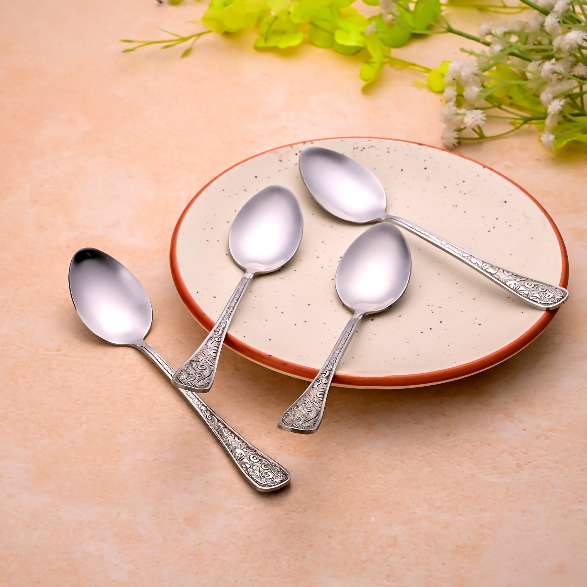 Silver Blossom Tea Spoons – Close-Up View of Decorative Design


