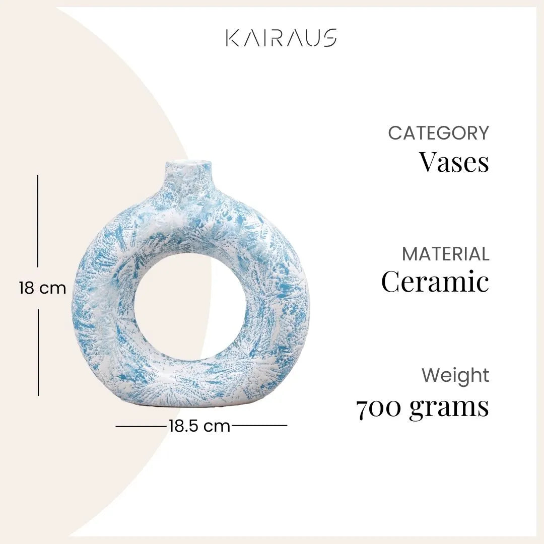 Minimalist sky blue donut-shaped vase with unique design

