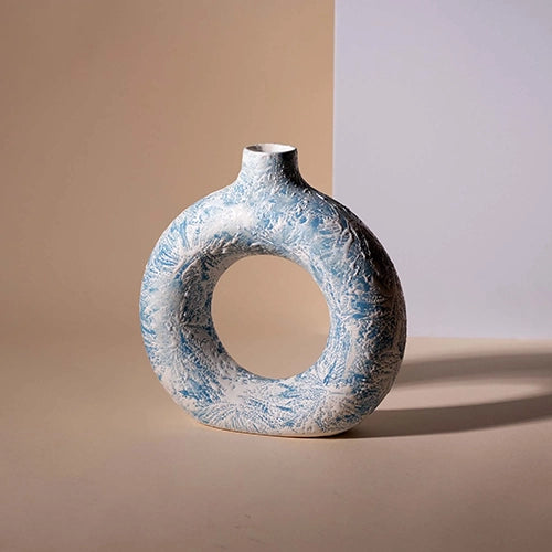Artistic sky blue ring-shaped flower vase for interior decor

