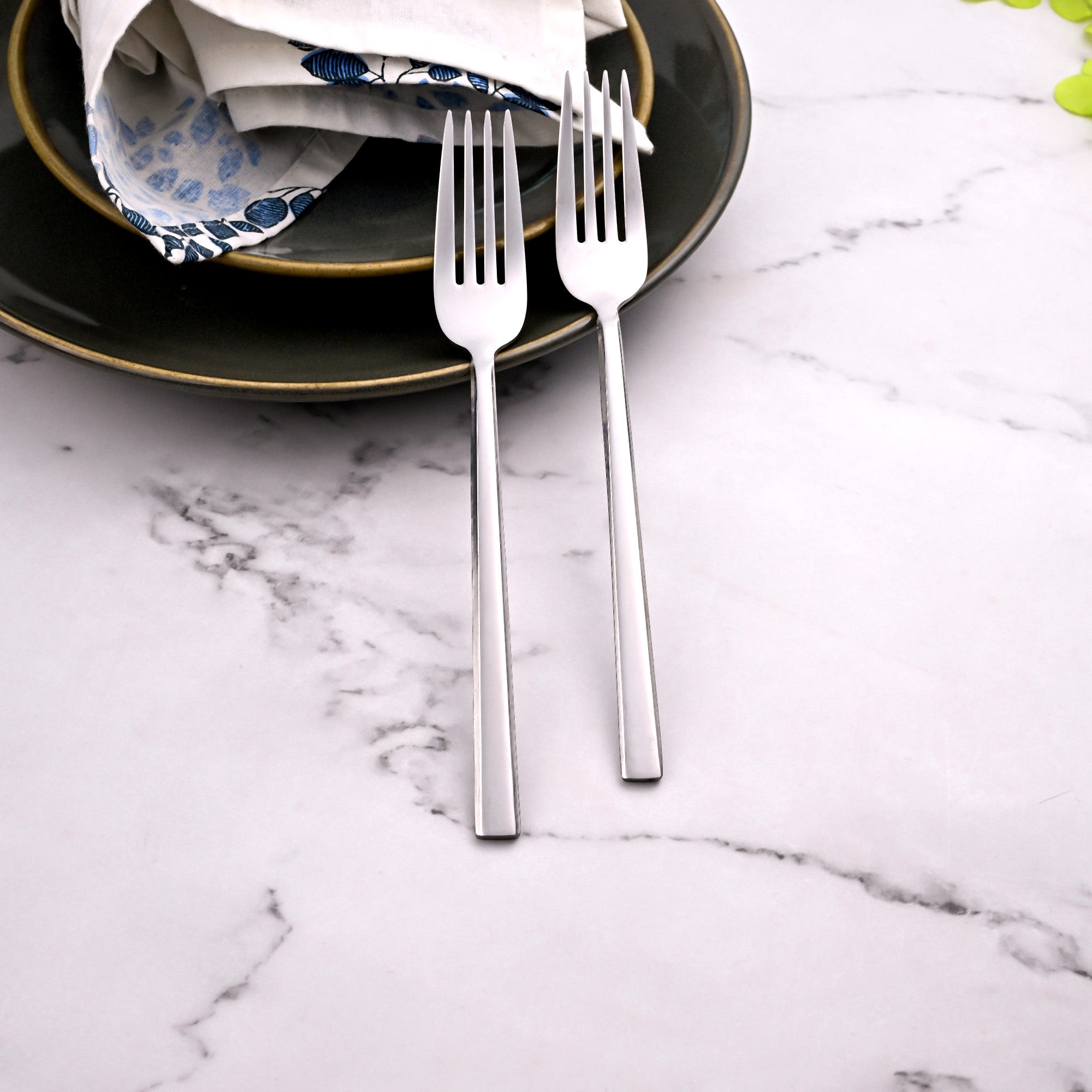 Close-Up View of SmoothGrip Stainless Steel Forks with a Shiny Finish

