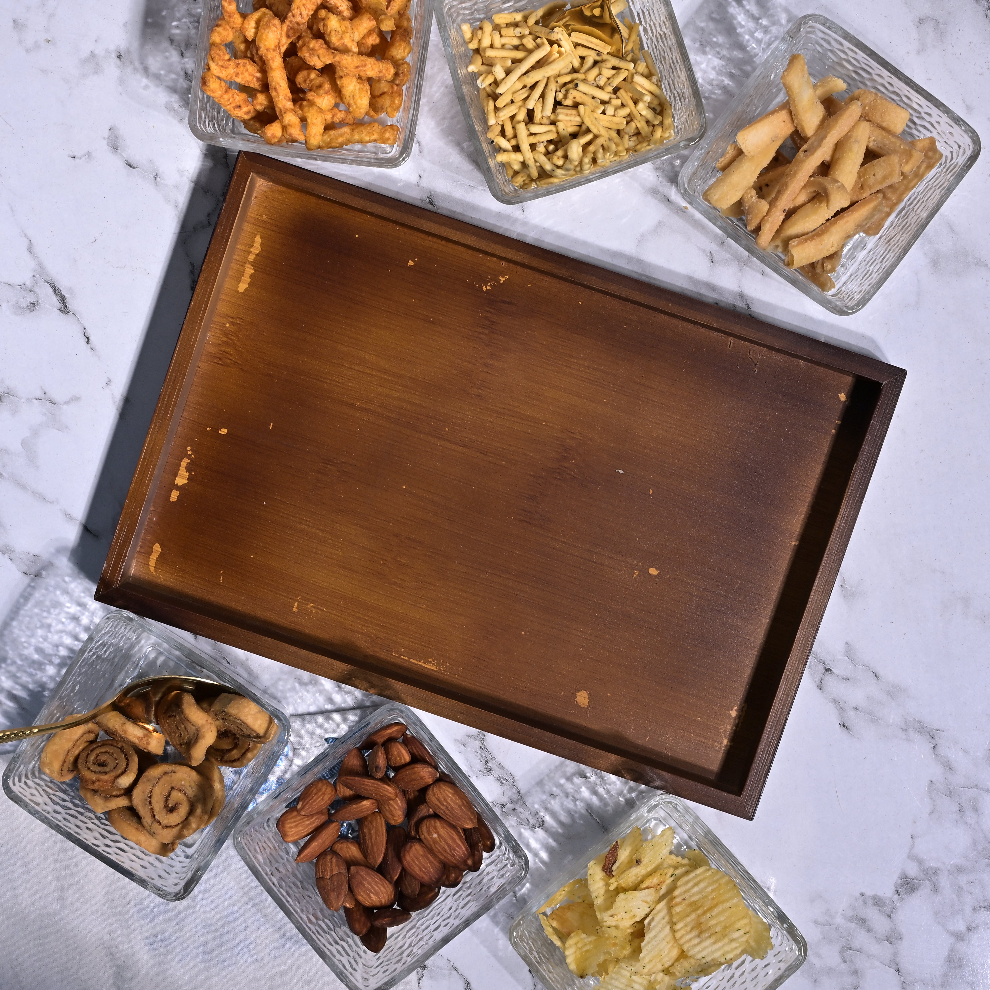 Decorative glass serving bowl on tray

