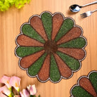 Starry green and white beaded mat for elegant dining
